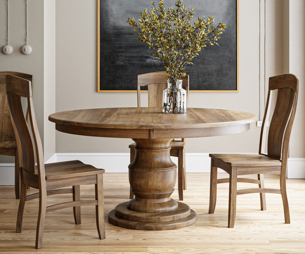 Room setting featuring a circular wooden table with a plant decoration on top and three chairs surrounding