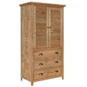 A wooden armoire with three drawers on the bottom and double doors on top
